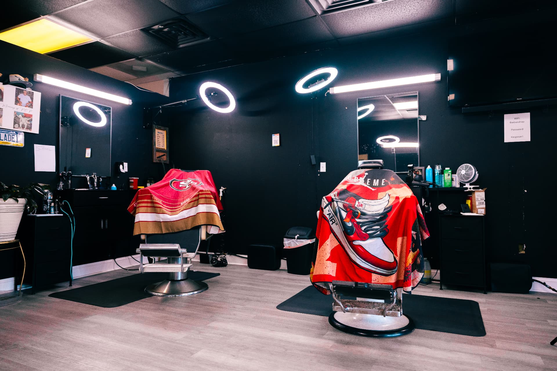 Barber stations with ring lights and mirrors inside Verified Cuts 2 in Fort Mill, SC.